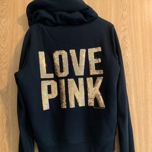 Gold “Love Pink” sequence on the back.
